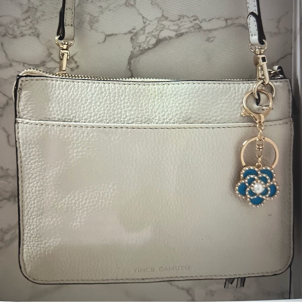 Vince Camuto White Pebbled Crossbody Bag with Floral Charm